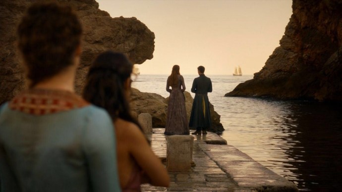 Ros and Shae watching Sansa and Littlefinger on the dock