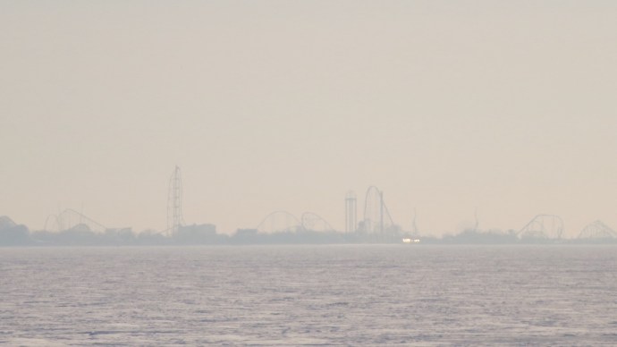 Cedar Point from across the lake.  High five, optical zoom!