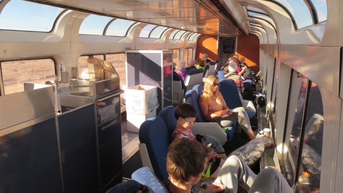 A popular spot.  People had already staked out seats and were playing cards.